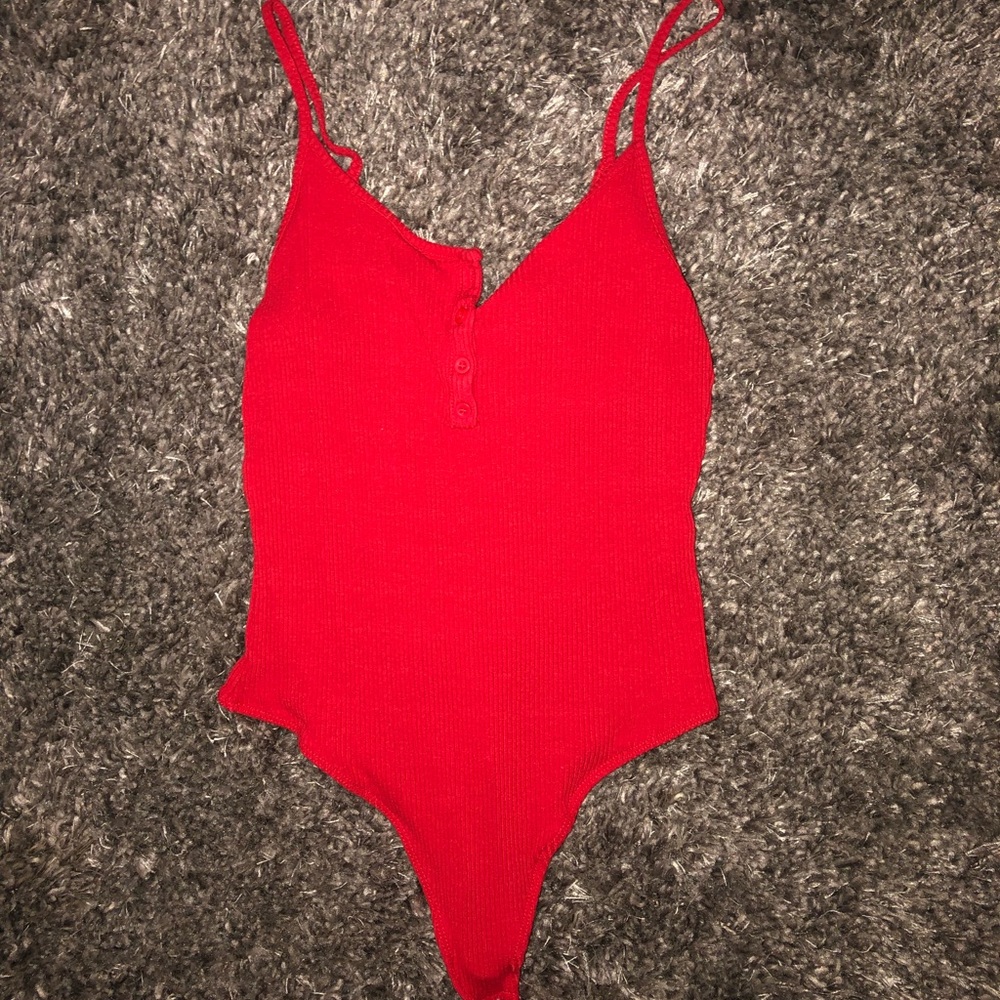 Red button down body suit